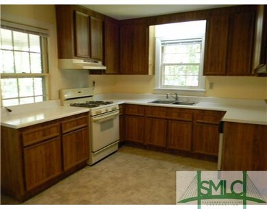 Kitchen. Kitchen with new flooring and frig.  Appl
