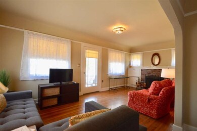 Enter home to a nice, open living room with firepl