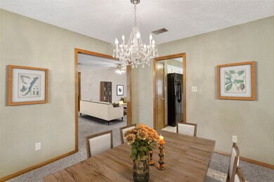 Dining area off kitchen and den ~