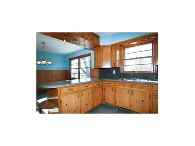 Knotty pine cabs*New counters*New backsplash*New l