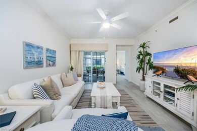 Living room with ceiling fan, light wood-type floo