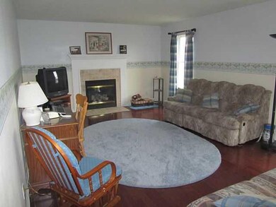 Family Room The family room features a gas firepla