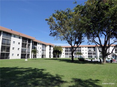 Back view Olympus Condo with pool area