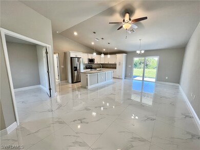 Living room, den and dining room area