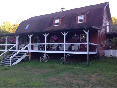 Facade/Exterior Front. Wonderful front porch spans