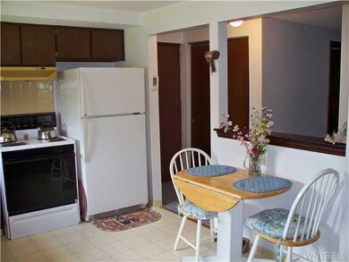 Kitchen. Eat-in kitchen with dishwasher.  Stove an