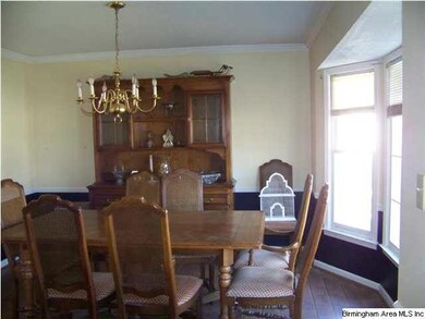 Formal Dining Room with bay window.