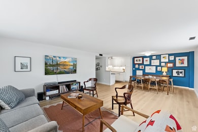 Living room featuring light real hardwood flooring.