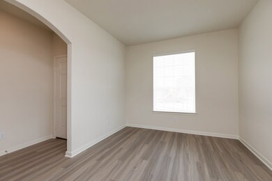 Located right off the kitchen this dining room is the perfect size for hosting family and friends.