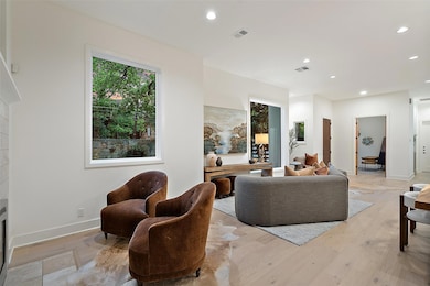 Living room featuring recessed lighting, plenty o