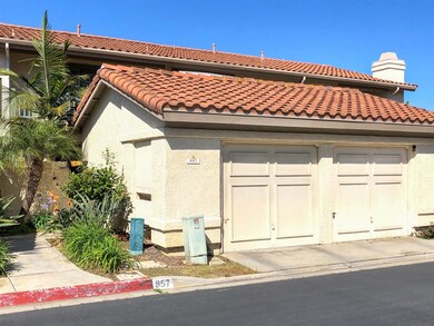 Welcome to 957 Fir Tree Place! The private entry gate, garage and front patio add to the tranquil home setting.