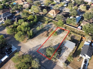 Aerial view of residential area featuring property boundaries highlighted