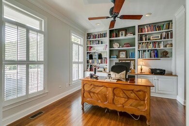 SAND/SEAL HARDWOOD FLOORS CROWN MOLDING NEWLY PAINTED CUSTOM PLANTATION SHUTTERS OPENS TO FOYER FRENCH DOORS BUILT IN CABINETRY/SHELVING FILE DRAWERS/TONS OF OFFICE DRAWER SPACE