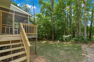 Back deck for grilling overlooking private backyar