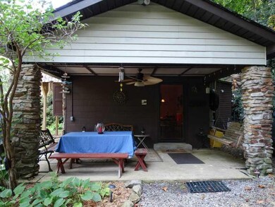 Patio/Deck. Entrance from the driveway goes from t