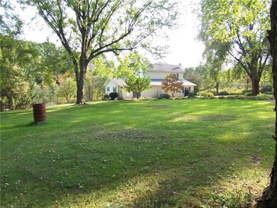 Park-like 2 acre level setting.