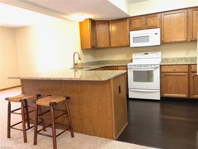 Kitchen showing newer bamboo flooring