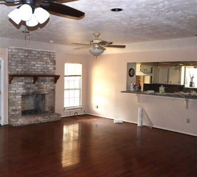 2nd view of living area into kitchen