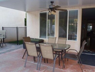 Covered patio with ceiling fan