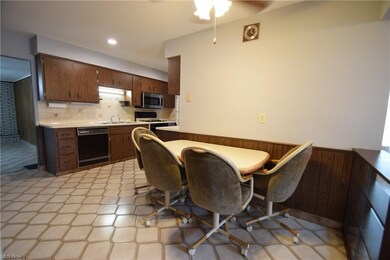 Eat-In Kitchen, Opens to Dining/Living Room area a