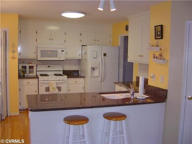 Kitchen - Granite Countertops, Hardwood Flooring, 
