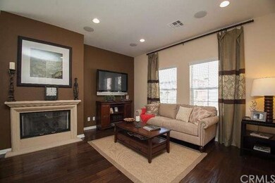 Family Room with Fireplace and prewired for flat s