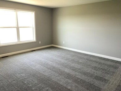 A look at the space of the bedrooms with large windows. Colors may vary.