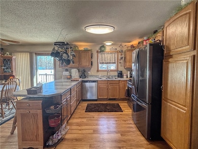 Kitchen offers newer appliances, lots of cabinetry