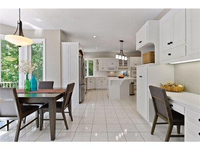 Built-in desk and informal dining located off of k