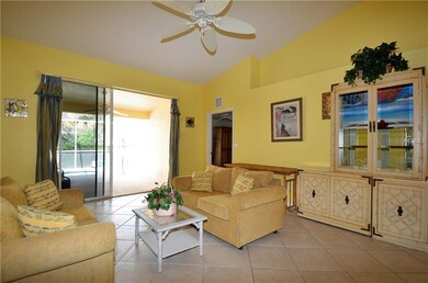Living room with cathedral ceiling and large slide