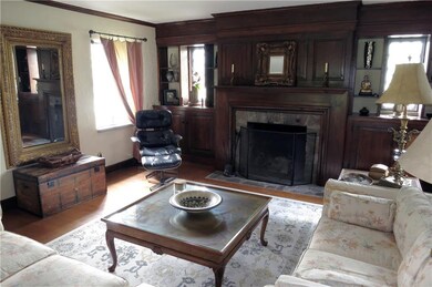 Living Room with Original Fireplace