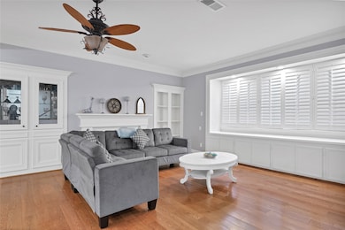 This living room features a cozy gray sectional, e