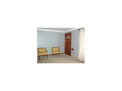 Living Room w/solid Wood Front Door.