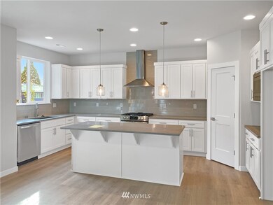 Pictures of another home with similar finishes. Some items may be optional.