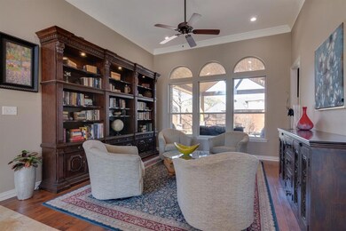 Relax after dinner with a nightcap and conversation in this inviting living space. Enjoy the view to the backyard and a northern exposure patio.