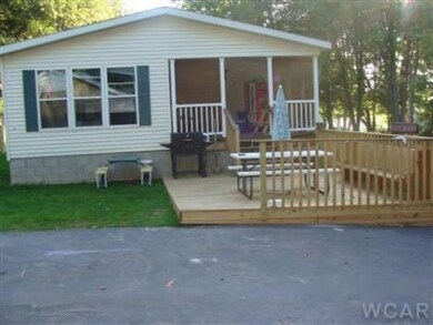 610 W Mohawk Trail, White Cloud, MI 49349 - photo 2