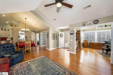 Vaulted Ceilings & Hardwoods throughout!