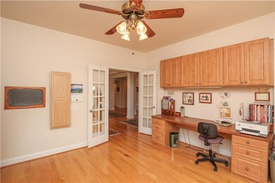 Another view of the office/study, showing the buil