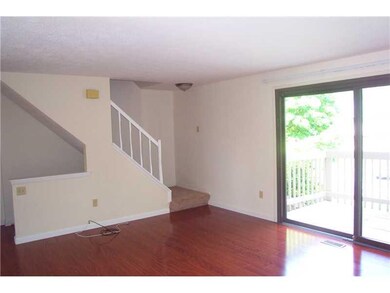 Living Room. New laminate wood flooring.  Sliding 