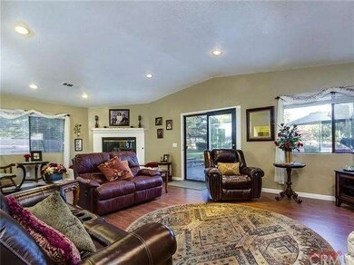 Family room has fireplace that can be wood burning
