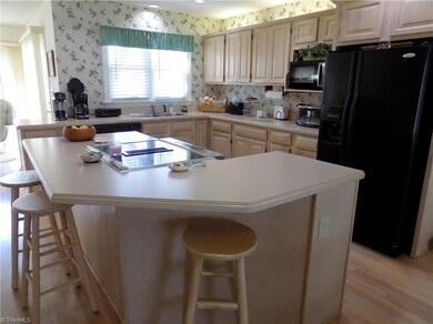 Kitchen Island w/ storage & built-in oven/range.
