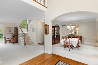 Entry accessing Dining room to right, study to lef