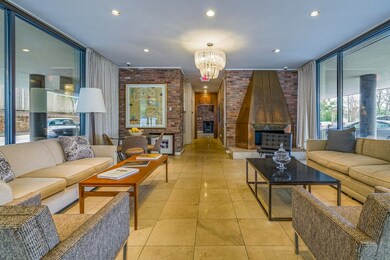 Looking toward the back of the lobby as well as th