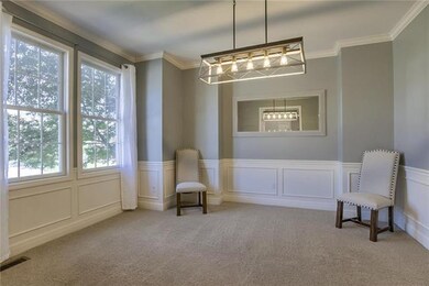 Formal dining with contemporary/vintage Edison bul