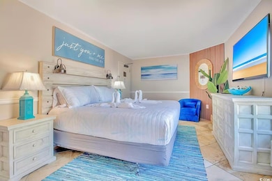 Bedroom featuring crown molding