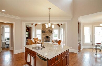 Beautiful granite in the kitchen. Kitchen opens to