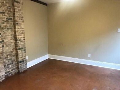 Dining area...has original brick walls...