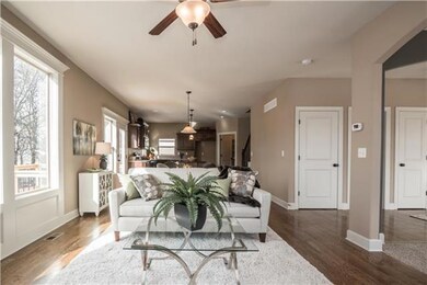 Enjoy views into Breakfast Room, Kitchen and Dinin