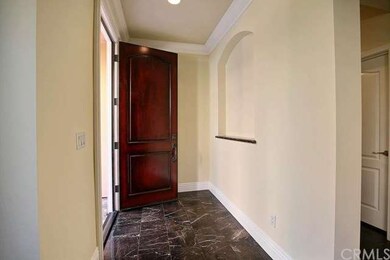Entryway with marble flooring