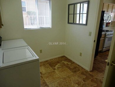 Property Photo. Separate laundry room with washer&